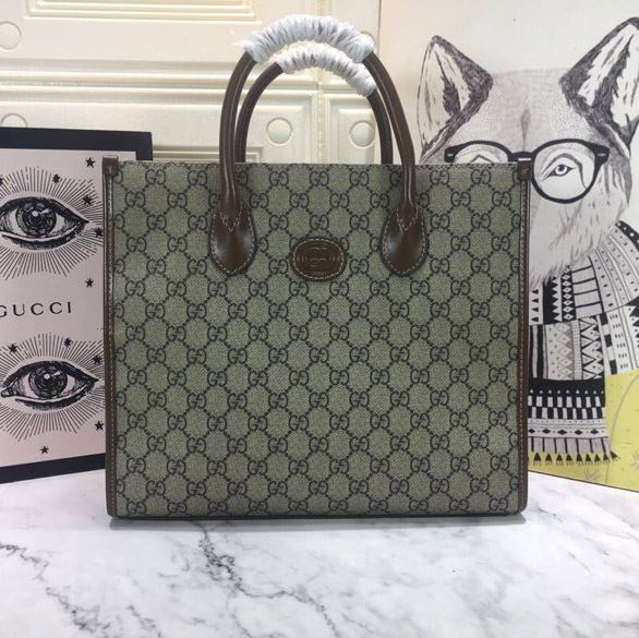 G*u*i shopping bags